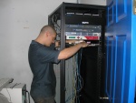 Ben installs small shelf for ADSL modems