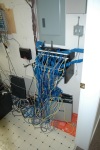 Wiring Closet before network overhaul - Ugly!